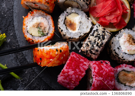 sushi rolls  beautiful served  at black dish. top view. close up 136806890