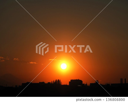 Orange sunset and the silhouette of Mount Fuji Orange sunset and the silhouette of Mount Fuji 136808800