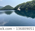 White bird flying over Lake Biwa 136809051