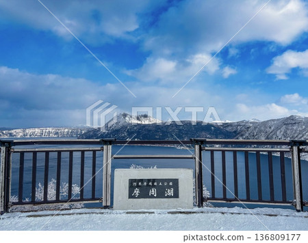 Lake Mashu and signboard in winter 136809177