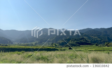 Rural landscape and mountain ranges in Itoshima City, Fukuoka Prefecture Rural landscape and mountain ranges in Itoshima City, Fukuoka Prefecture 136810842