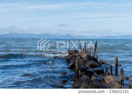 Lake Biwa in midwinter and the snowy mountains of Kohoku in the distance Lake Biwa in midwinter and the snowy mountains of Kohoku in the distance 136812101
