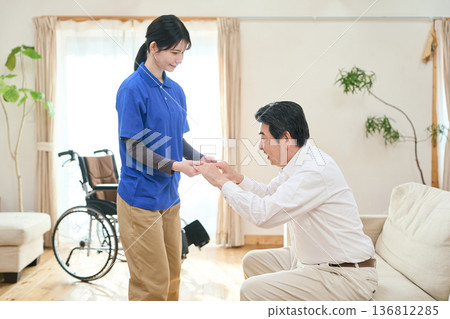 Caregivers providing home care to seniors 136812285