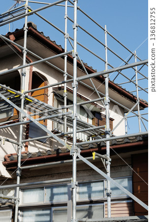 House with scaffolding House with scaffolding 136812755