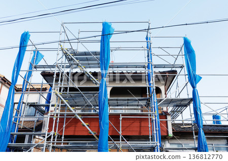 House with scaffolding House with scaffolding 136812770