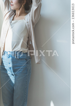 A woman by the window in the setting sun (model, fashion, light, shadow) A woman by the window in the setting sun (model, fashion, light, shadow) 136813013