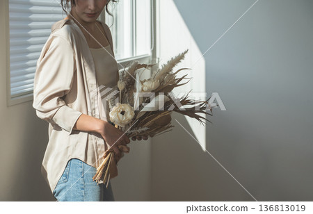 A woman by the window in the setting sun (model, fashion, light, shadow) A woman by the window in the setting sun (model, fashion, light, shadow) 136813019