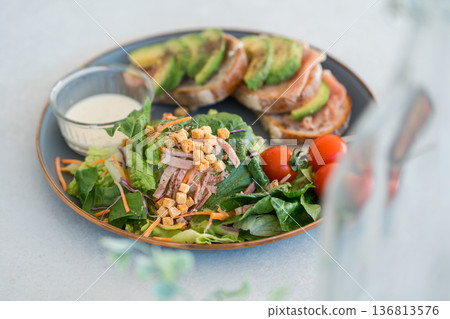 A plate of food on the dining table A plate of food on the dining table 136813576