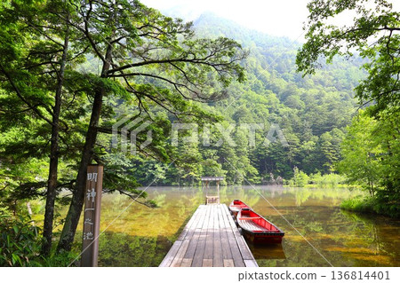 Myojin Ichinoike Pond, a power spot in the grounds of the Okumiya Shrine of Hotaka Shrine in Kamikochi in summer 136814401