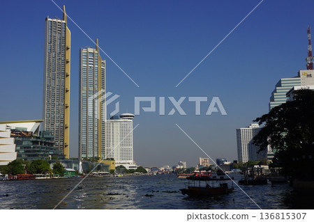 Skyscrapers along the Chao Phraya River in Bangkok, Thailand 136815307