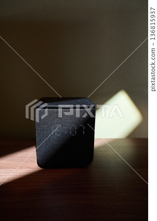Modern Smart Speaker on Wooden Surface 136815937