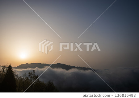 Mountains floating in a sea of clouds in the morning Mountains floating in a sea of clouds in the morning 136816498