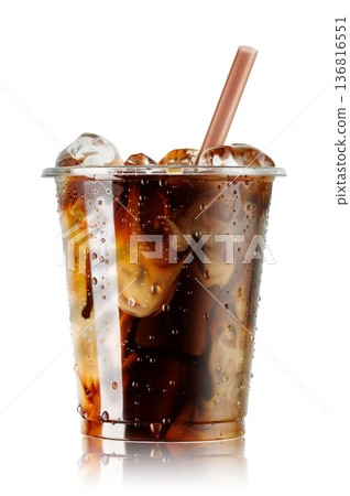 Iced coffee blended with milk in fogged disposable plastic cup isolated on white background Iced coffee blended with milk in fogged disposable plastic cup isolated on white background 136816551
