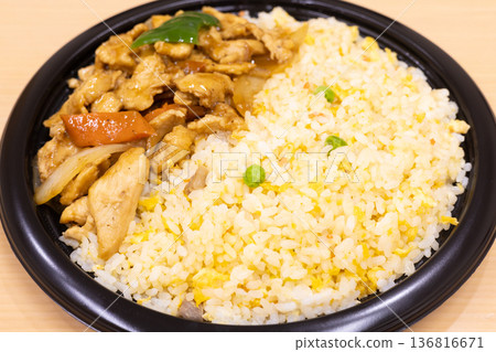 Delicious Chinese bento fried rice and stir-fried pork and vegetables Delicious Chinese bento fried rice and stir-fried pork and vegetables 136816671
