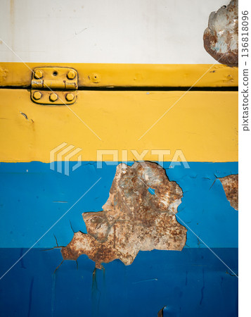 Peeling Paint on Old Metal Surface with Yellow Hinge and Rust Damage Peeling Paint on Old Metal Surface with Yellow Hinge and Rust Damage 136818096