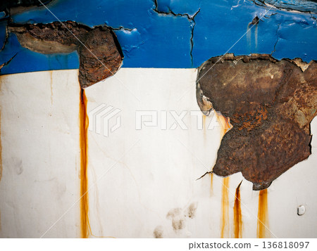 Peeling Paint on Old Metal Surface with Yellow Hinge and Rust Damage Peeling Paint on Old Metal Surface with Yellow Hinge and Rust Damage 136818097