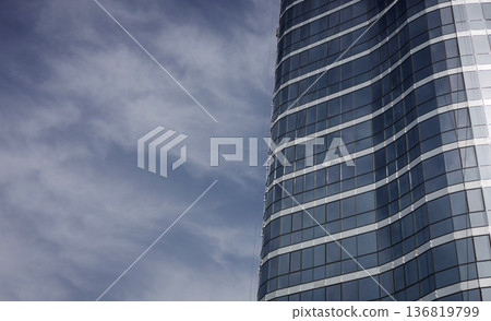 Office building against blue sky. Office building against blue sky. 136819799