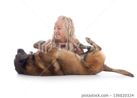 malinois and woman in studio 136820324