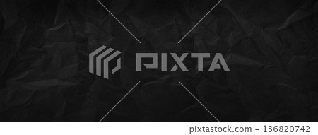 Black crumpled paper background creating abstract textured pattern Black crumpled paper background creating abstract textured pattern 136820742