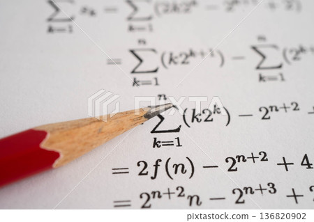 Pencil on mathematic formula exercise test paper in education school. Pencil on mathematic formula exercise test paper in education school. 136820902