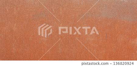 Rusty metal surface showing weathered oxidation background texture 136820924