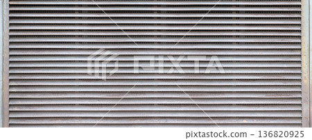 Metal louvers forming an industrial air vent texture Metal louvers forming an industrial air vent texture 136820925