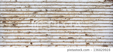 Rusty metal shutter showing weathered texture and aging Rusty metal shutter showing weathered texture and aging 136820928