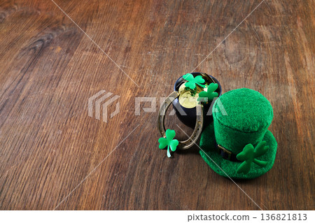 St. Patrick's day leprechaun hat and pot of gold symbolizing irish luck 136821813