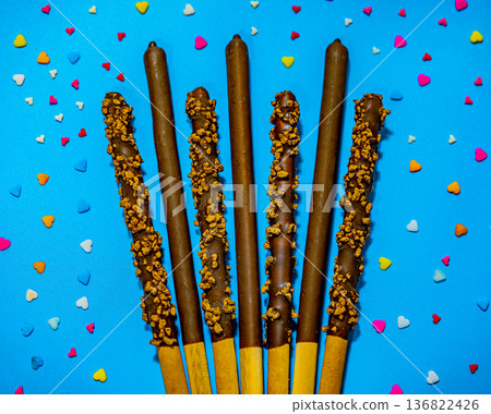 Dropped in chocolate a stick cookie Pepero. November 11th is Pepero Day in Korea 136822426