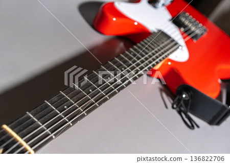 Red Guitar Neck Close-Up 136822706
