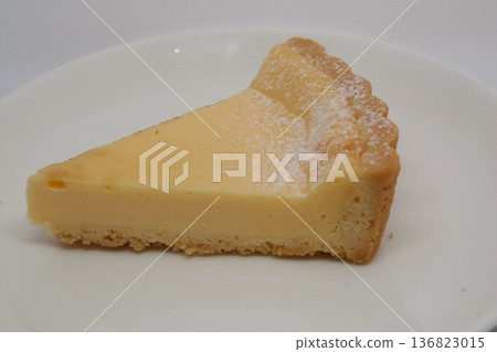 Cheesecake on a white plate 136823015