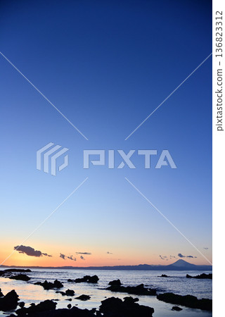 Mount Fuji at dusk as seen from Wada Beach on the Miura Peninsula Mount Fuji at dusk as seen from Wada Beach on the Miura Peninsula 136823312