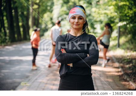 Group of runners are together outdoors Group of runners are together outdoors 136824268