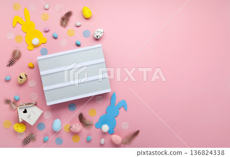 Easter spring  holiday card. Playful bunny, painted eggs, spring flowers, decorative elements on light pink background 136824338