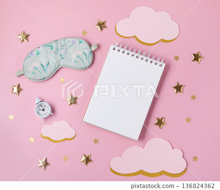 World Sleep Day concept. Bedtime accessories, sleeping mask,  white classic alarm clock on pastel pink background 136824362