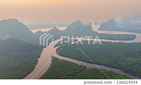Aerial iew of sweet sunrise Scenic Mangrove River with heart island 136824934