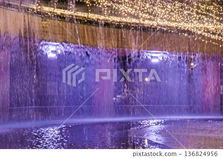 The lit-up fountain plaza at Fugan Canal Kansui Park in Toyama City is even more beautiful with the falling snow. The lit-up fountain plaza at Fugan Canal Kansui Park in Toyama City is even more beautiful with the falling snow. 136824956