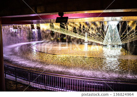 The lit-up fountain plaza at Fugan Canal Kansui Park in Toyama City is even more beautiful with the falling snow. The lit-up fountain plaza at Fugan Canal Kansui Park in Toyama City is even more beautiful with the falling snow. 136824964