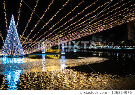 The lit-up fountain plaza at Fugan Canal Kansui Park in Toyama City is even more beautiful with the falling snow. The lit-up fountain plaza at Fugan Canal Kansui Park in Toyama City is even more beautiful with the falling snow. 136824976