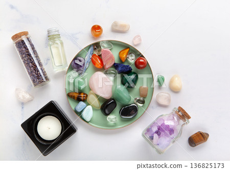 Chakra Crystal Healing Ritual With Lavender Palo Santo White Sage Essential Oils And Candles On White Marble Background Chakra Crystal Healing Ritual With Lavender Palo Santo White Sage Essential Oils And Candles On White Marble Background 136825173