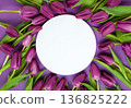 Mother's Day, Woman's day holiday card with purple tulips flowers  on purple background. Top view, copy space 136825222