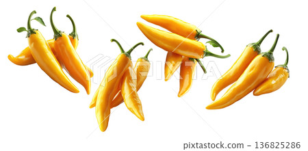 Fresh yellow chili peppers in various bunches, isolated on clean white background, concept of spicy food 136825286