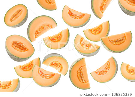 Fresh cantaloupe melon wedges with seeds displayed in a scattered seamless pattern, on white background, concept of summer fruit 136825389