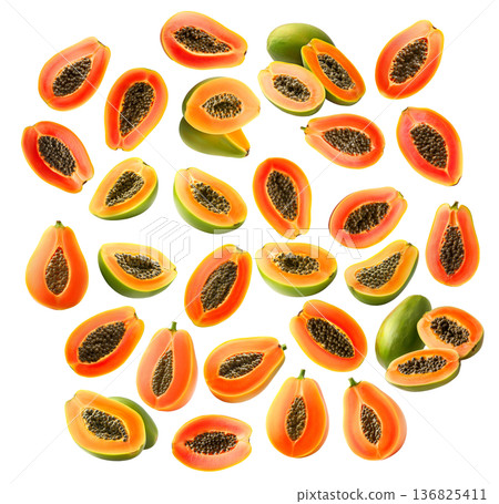 Multiple ripe papaya halves with dark seeds shown isolated on white background, representing a fresh tropical fruit concept Multiple ripe papaya halves with dark seeds shown isolated on white background, representing a fresh tropical fruit concept 136825411