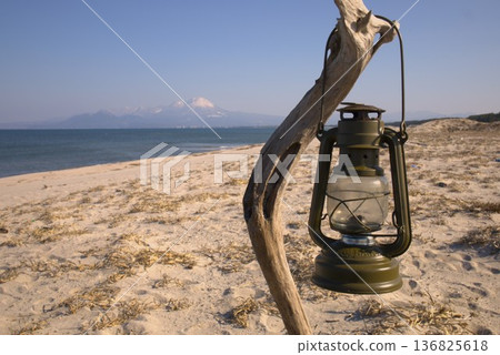 Driftwood and lantern Driftwood and lantern 136825618