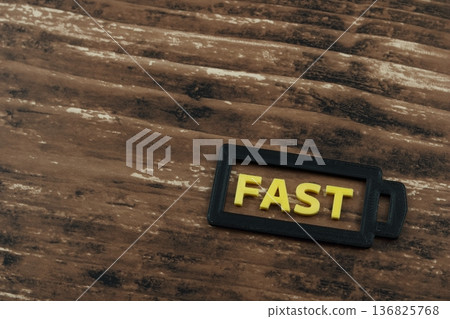 一個三維立體的FAST標誌,展現出速度感。 一個三維立體的FAST標誌,展現出速度感。 136825768