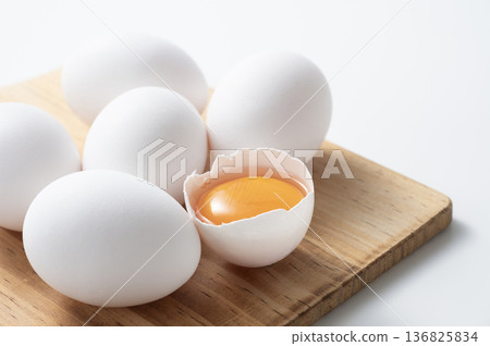 Yolk of raw egg 136825834