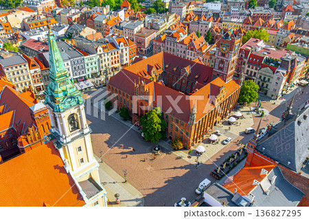 Aerial panoramic view of historical buildings and roofs in Polish medieval town Torun 136827295