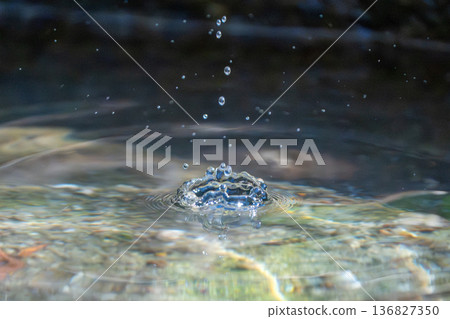 Reflections on the water surface Reflections on the water surface 136827350