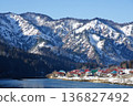 The snow-capped mountains and the Oshi village in Fukushima Prefecture, nestled along the Tadami River 136827492